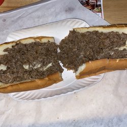 Village Grill & Pizzeria - Ordered a steak n cheese and the cheese and meat were separate. It was also Popeyes biscuits dry. Couldn't finish