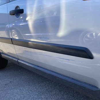 Lanier Auto Body and Paint - Damage w/ cracked paint and scuffed moulding - Body Shops Near Me - Raleigh, North Carolina Lanier Auto Body and Paint - Damage w/ cracked paint and scuffed moulding - Body Shops Near Me - Raleigh, North Carolina