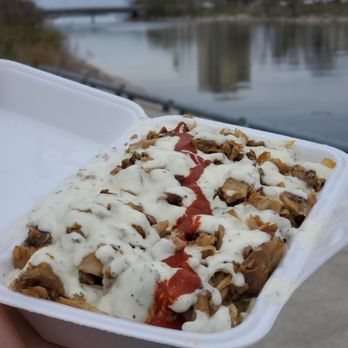 Lazeez Shawarma - Regular Half & Half Beef Shawarma eaten along the bank of Credit River. $11.63 after tax. - Middle Eastern Near Me - Mississauga, Ontario Lazeez Shawarma - Regular Half & Half Beef Shawarma eaten along the bank of Credit River. $11.63 after tax. - Middle Eastern Near Me - Mississauga, Ontario