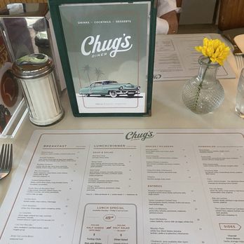 Chug's Diner - Menu / Table shot with fresh flower vase - Cuban Near Me - Miami, Florida Chug's Diner - Menu / Table shot with fresh flower vase - Cuban Near Me - Miami, Florida