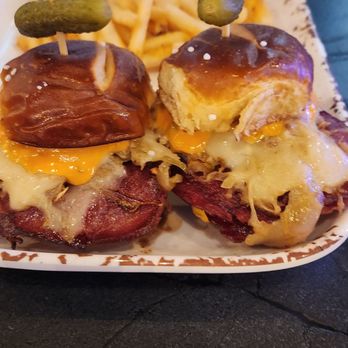 SportyPickle - Rally'n Ruben - X2 sliders: corned beef, tangy sauerkraut, melted Swiss cheese and thousand Island dressing all stacked on a pretzel bun - Sports Bars Near Me - Englewood, Colorado