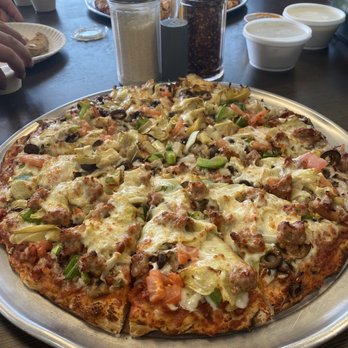 Magoos Pizza - One of the BEST Veggie pizzas in town. This one is Half Veggie & Half Veggie w/sausage - Pizza Near Me - Bakersfield, California Magoos Pizza - One of the BEST Veggie pizzas in town. This one is Half Veggie & Half Veggie w/sausage - Pizza Near Me - Bakersfield, California