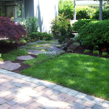 All Weather Property Services - a brick path in a garden - Landscaping Near Me - Arnold, Maryland All Weather Property Services - a brick path in a garden - Landscaping Near Me - Arnold, Maryland