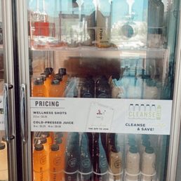 Their juice fridge & pricing! So many options!! Even a coffee option!