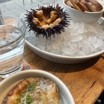 Taylor Shellfish Farms - Baked oyster and fresh uni with toast - Seafood Near Me - Seattle, Washington