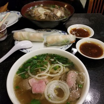 Pho Saigon - Large special pho (back), shrimp spring rolls (middle) and tendon brisket tripe steak pho (front). Really missed this! - Vietnamese Near Me - Kent, Washington Pho Saigon - Large special pho (back), shrimp spring rolls (middle) and tendon brisket tripe steak pho (front). Really missed this! - Vietnamese Near Me - Kent, Washington