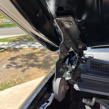 Orlando Auto Body - Paid to replace hood hinges. Reused old ones. - Body Shops Near Me - Mesa, Arizona