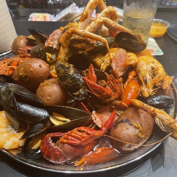 Mr. Crabby’s - You choose sea food options included snow crab shrimp black mussels and crawfish - Seafood Near Me - Live Oak, Texas