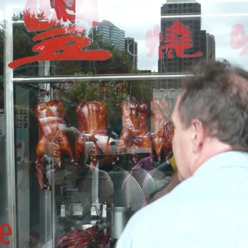 Hawaii Food Tours - BBQ Meat and Matthew eyeing it through the glass - Food Tours Near Me Hawaii Food Tours - BBQ Meat and Matthew eyeing it through the glass - Food Tours Near Me