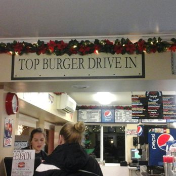 Top Burger - Top Burger Drive-In sign above the front counter with pretty Christmas decorations - Burgers Near Me - Camas, Washington Top Burger - Top Burger Drive-In sign above the front counter with pretty Christmas decorations - Burgers Near Me - Camas, Washington
