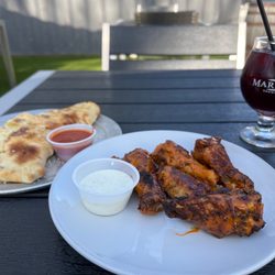 Station 7 Tavern - Happy hour wings and garlic cheese bread with a sangria