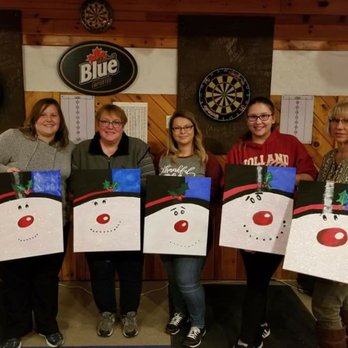Gera Tavern - a group of people holding up snowmen - Dive Bars Near Me - Frankenmuth, Michigan Gera Tavern - a group of people holding up snowmen - Dive Bars Near Me - Frankenmuth, Michigan