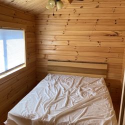 Hocking Hills Jellystone Park - Yogi bear cabin bed room, ceiling fan was very nice! Plugs on both side of bed