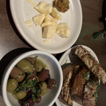 Culinary Dropout - Marinated Olives, Prairie Breeze Cheddar, Crusty Bread, Garlic Oil & Balsamic - New American Near Me - Charlotte, North Carolina