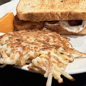 Sweetwater Cafe - Egg Sandwich with potato pancake - Breakfast & Brunch Near Me - Charleston, South Carolina Sweetwater Cafe - Egg Sandwich with potato pancake - Breakfast & Brunch Near Me - Charleston, South Carolina