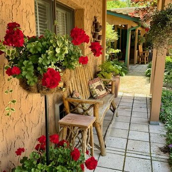 Hemlock Inn - Just one area of the many flower basket planted at Hemlock Inn - Hotels Near Me - Blowing Rock, North Carolina