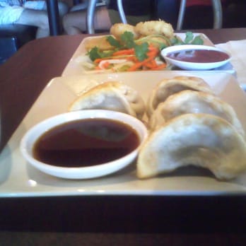 Saigon Bistro - Potstickers with Crispy Calamari in back - Vietnamese Near Me - Concord, California Saigon Bistro - Potstickers with Crispy Calamari in back - Vietnamese Near Me - Concord, California