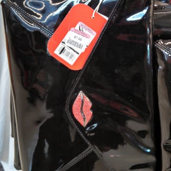 Goodwill Industries of the Columbia Willamette - Plenty of brand new, shiny plastic clutches with bejeweled red lips for $7.99 - Thrift Stores Near Me - Hazel Dell, Washington