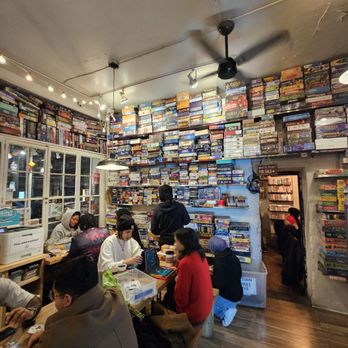The Uncommons - people sitting at tables in a bookstore - Coffee & Tea Near Me - New York, New York The Uncommons - people sitting at tables in a bookstore - Coffee & Tea Near Me - New York, New York