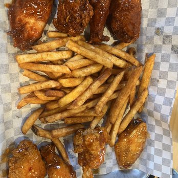 Wings N' Wine - Half breaded Mango Habanero and Half Nashville Hot wings - Chicken Wings Near Me - Sugar Land, Texas Wings N' Wine - Half breaded Mango Habanero and Half Nashville Hot wings - Chicken Wings Near Me - Sugar Land, Texas