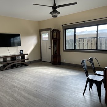 Viloor Flooring - a living room with a flat screen tv - Flooring Near Me - Honolulu, Hawaii Viloor Flooring - a living room with a flat screen tv - Flooring Near Me - Honolulu, Hawaii