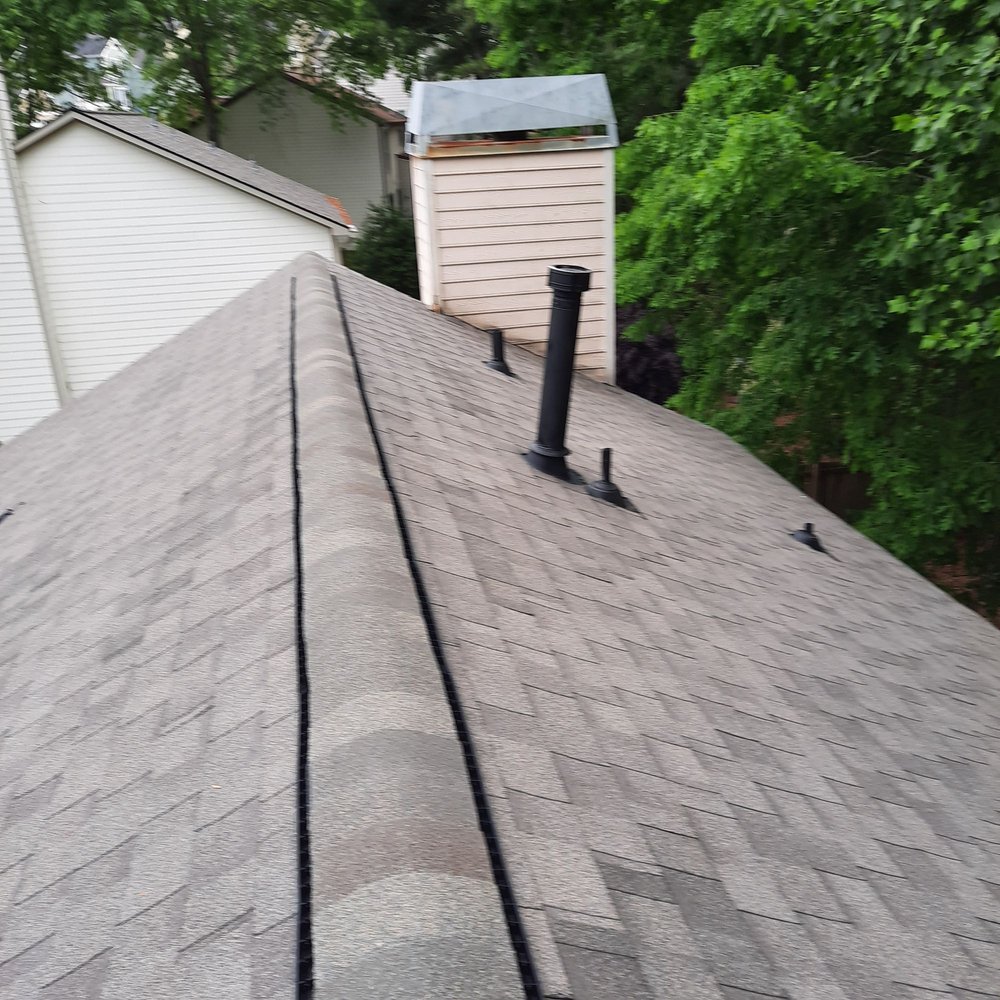 Slide of Arbra Roofing