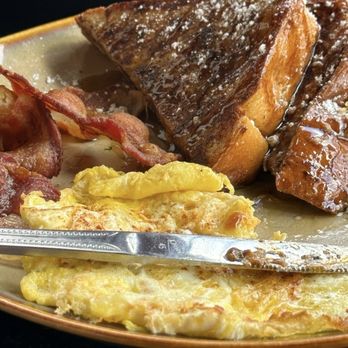 Curio Bistro - Caramelized Baked French Toast Brunch - Cajun/Creole Near Me - New Orleans, Louisiana Curio Bistro - Caramelized Baked French Toast Brunch - Cajun/Creole Near Me - New Orleans, Louisiana