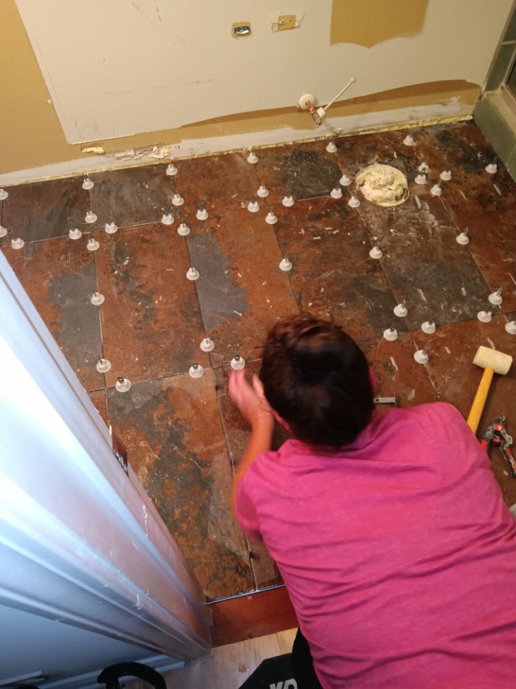 Slide of Bathmatic Custom Tile and Shower