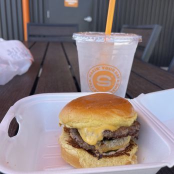 Smalls Sliders - Biggie Small with a pickle and sauce. - New American Near Me - Stockbridge, Georgia
