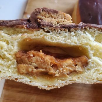 California Donuts - Piece of dry, chunky peanut butter. Not a Reese's peanut butter cup. - Donuts Near Me - Los Angeles, California