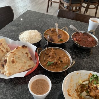 Mythri's Indian Cuisine - Naan, Plain Rice, Chai, Bagara Baingan, Lamb Vindaloo, Chicken Chettinad, Samosa Chat... not shown: two very full and happy people :) - Indian Near Me - Irving, Texas