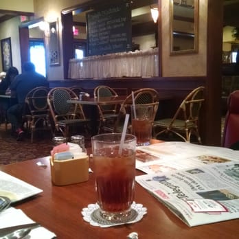 Mimi's Cafe - My view from a booth seat. This place is cozy. Love the comfortable seats! Also, it makes my momma happy to go out! - American Near Me - Arlington, Texas