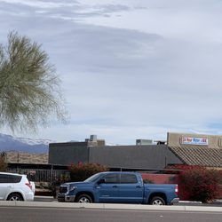 Fountain Hills Water & Ice - Snow on hills behind the Water and Ice store January 28, 2021