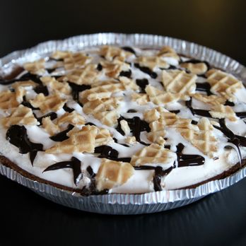 Scoops Ice Cream House - a pie with chocolate and marshmallows - Ice Cream & Frozen Yogurt Near Me - Chilton, Wisconsin Scoops Ice Cream House - a pie with chocolate and marshmallows - Ice Cream & Frozen Yogurt Near Me - Chilton, Wisconsin