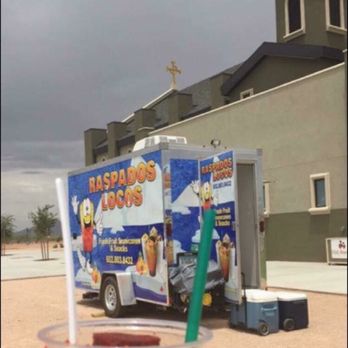 Raspados Locos - a person holding a drink in front of a food truck - Food Trucks Near Me - Maricopa, Arizona Raspados Locos - a person holding a drink in front of a food truck - Food Trucks Near Me - Maricopa, Arizona