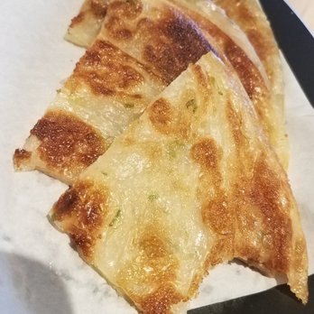 Kirin Noodle Bar - Scallion pancakes (with a bite out, of course.) - Ramen Near Me - Columbus, Ohio Kirin Noodle Bar - Scallion pancakes (with a bite out, of course.) - Ramen Near Me - Columbus, Ohio