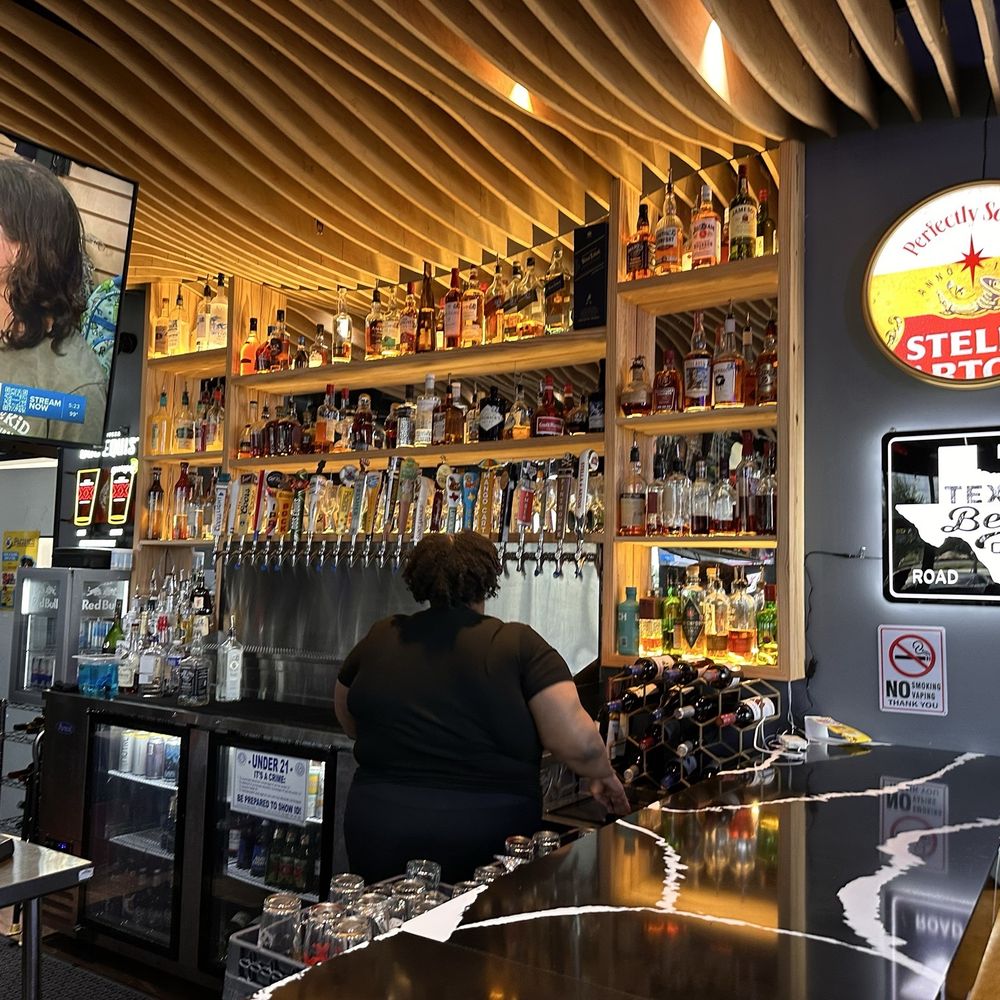 Hype Bar and Grill - Ample bar back and wraparound counter. - Burgers Near Me - Cedar Park, Texas