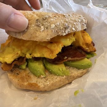 Stir It Up Coffee Shop & Bakery - Multigrain bagel with bacon, egg, cheese, avocado, and hot honey. A great combo to try if you haven't already. - Bakeries Near Me - Saint Thomas, Virgin Islands Stir It Up Coffee Shop & Bakery - Multigrain bagel with bacon, egg, cheese, avocado, and hot honey. A great combo to try if you haven't already. - Bakeries Near Me - Saint Thomas, Virgin Islands