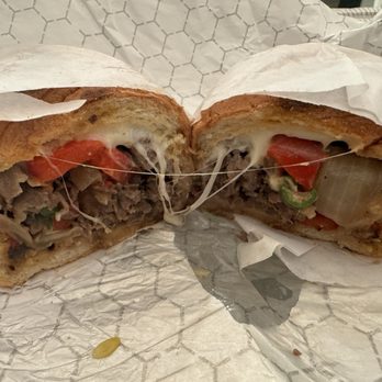 Caps & Corks - Cheesesteak! It looks small in the pic, but it's huge in real life. - Beer, Wine & Spirits Near Me - Torrance, California Caps & Corks - Cheesesteak! It looks small in the pic, but it's huge in real life. - Beer, Wine & Spirits Near Me - Torrance, California