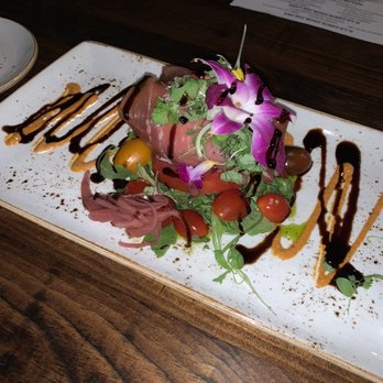 Jimmy P's Charred - Burrata and tomato salad - Steakhouses Near Me - Naples, Florida Jimmy P's Charred - Burrata and tomato salad - Steakhouses Near Me - Naples, Florida