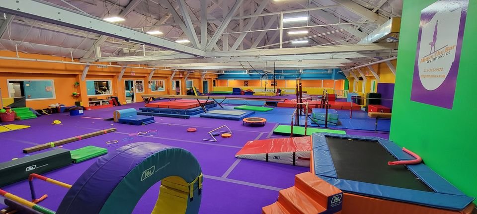 Above The Bar Gymnastics Logo