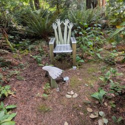 Matzke Fine Art Gallery and Sculpture Park - Artist Debbi Rhodes "Stainless Steel Armchair & foot stool" in the park Photo: AreYouThatWoman.com