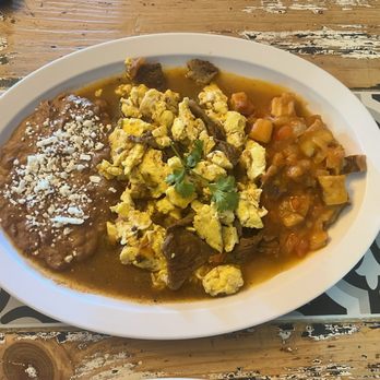 Xochipilli Taco Bar - Try our popular Xochipilli Breakfast plate. Scrambled eggs with chopped steak in a molcajete salsa. - New Mexican Cuisine Near Me - Van Nuys, California Xochipilli Taco Bar - Try our popular Xochipilli Breakfast plate. Scrambled eggs with chopped steak in a molcajete salsa. - New Mexican Cuisine Near Me - Van Nuys, California