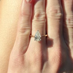 Pear solitaire engagement ring