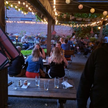 Jupiter - Bench seating and table seating on the patio. - Pizza Near Me - Berkeley, California Jupiter - Bench seating and table seating on the patio. - Pizza Near Me - Berkeley, California