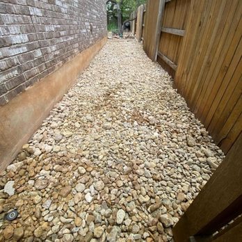 Grace Landscaping and Tree Service - River rock added to the side of our home by Daniel Flores of Grace Landscaping and tree service. - Landscaping Near Me