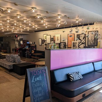 MOXY Phoenix Tempe - Part of the lobby with pinball machines and other games - Hotels Near Me - Tempe, Arizona