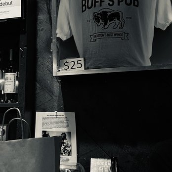 Buff's Pub - a t - shirt hanging on a wall - American Near Me - Newton, Massachusetts