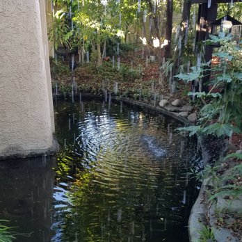 Orange Hill Restaurant & Events - Raining onto the pond - Steakhouses Near Me - Orange, California