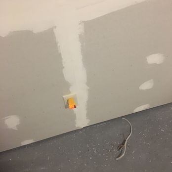 Norman's Home Improvements - Installed outlet - Electricians Near Me